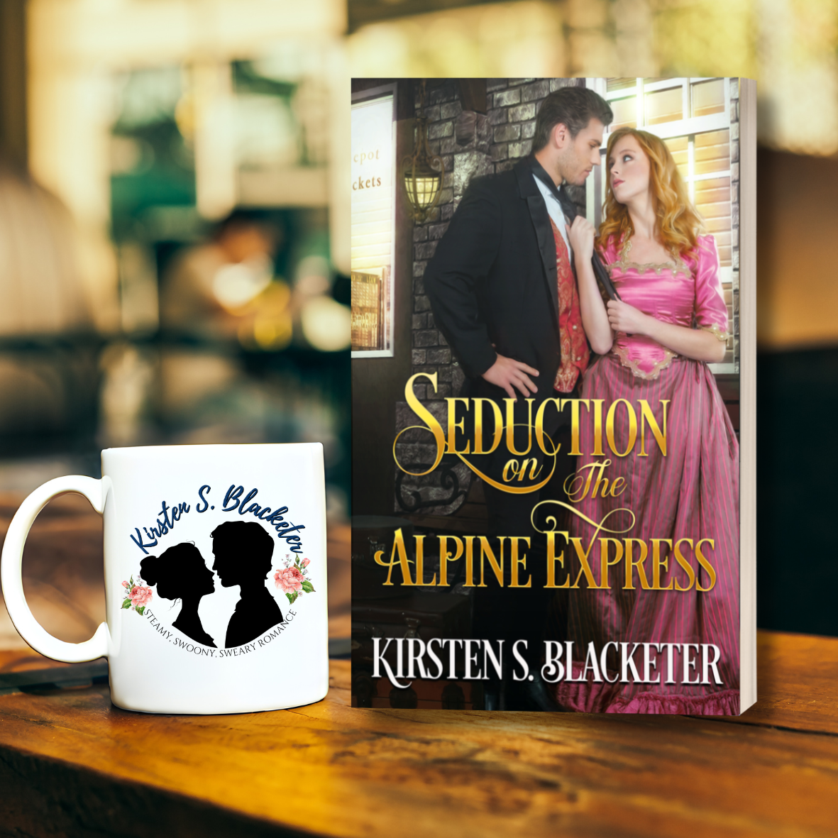 Romantic paperback cover with Victorian couple embracing in front of a train station, titled Seduction on the Alpine Express.