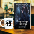 The Huntsman’s Revenge paperback book with dark forest cover featuring a woman in a black cloak and a black panther in the background. Book is displayed beside a white mug with the author's logo and a silhouette of a couple.