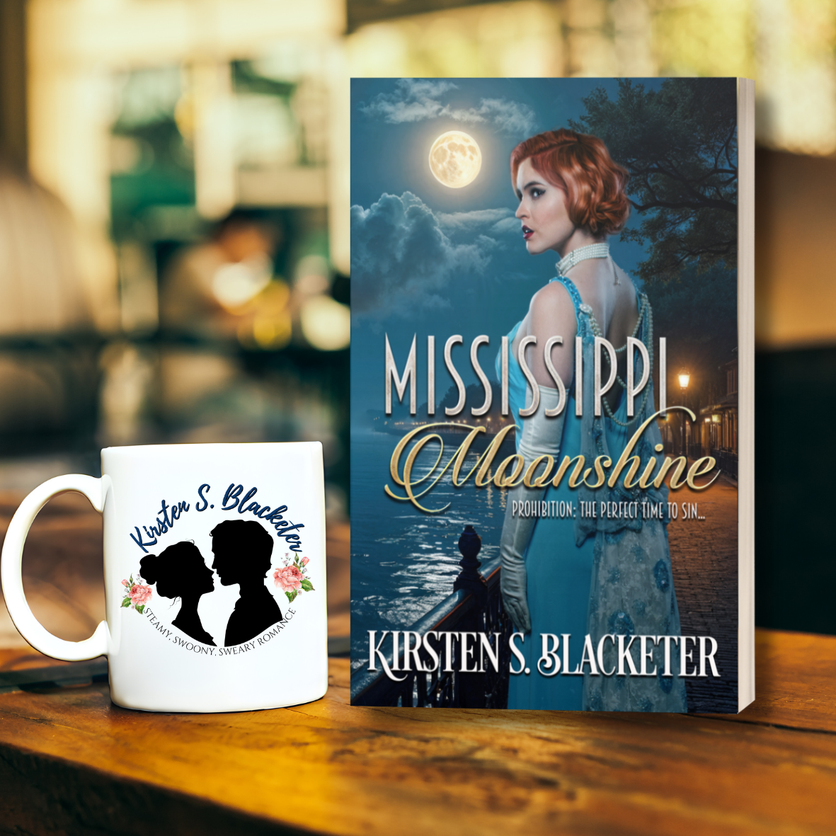 Mississippi Moonshine  paperback book cover with a redheaded woman in vintage dress standing beside a river under a full moon at night.
