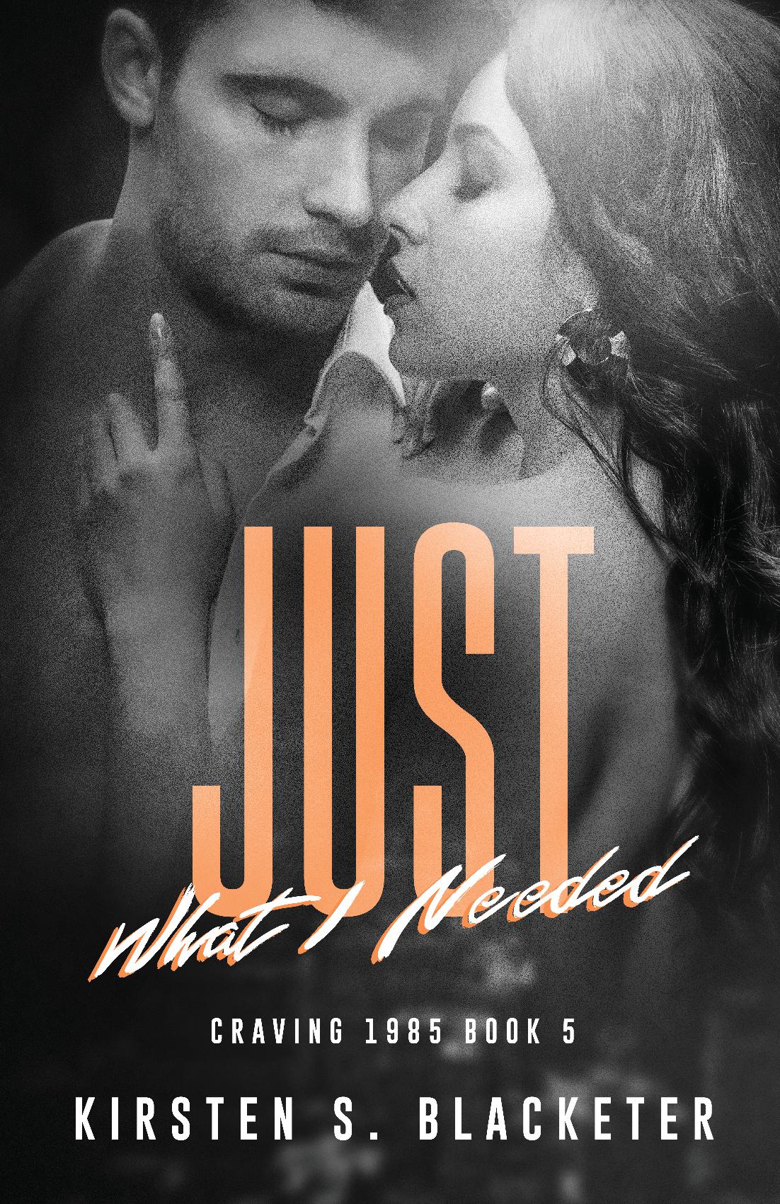Romantic black and white cover with close-up of a man and woman embracing, bold orange title Just What I Needed.